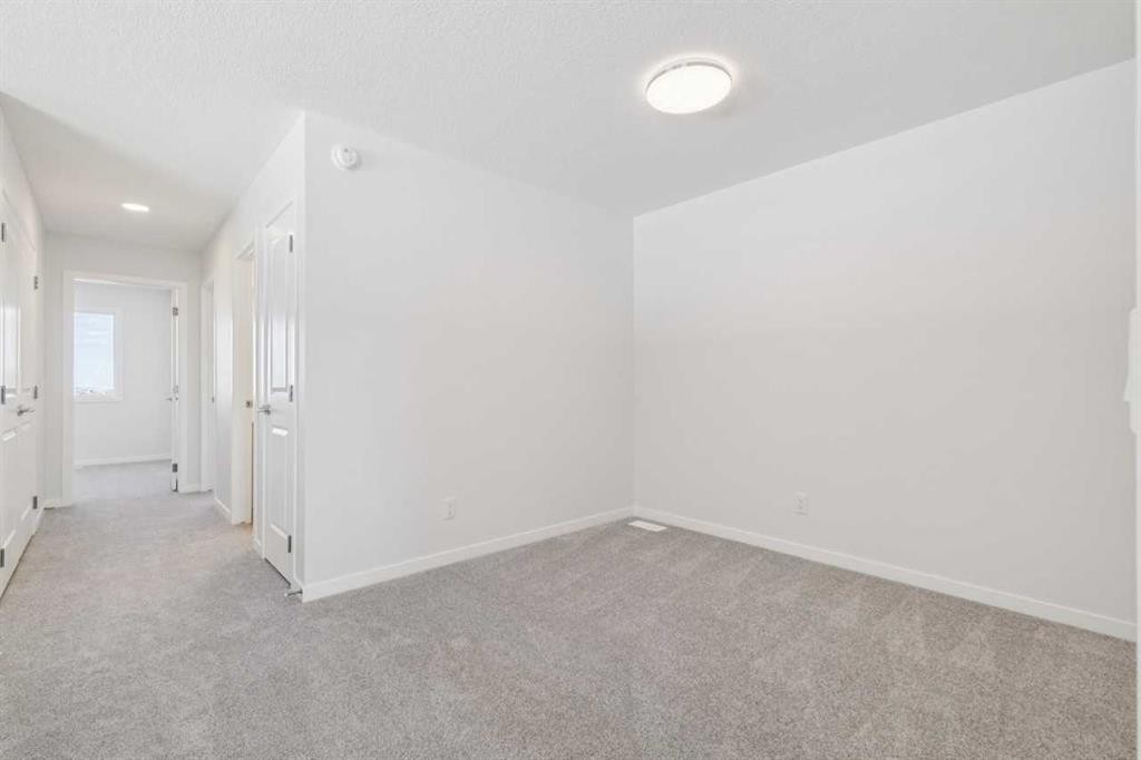 70 Lucas Heath Nw, Calgary, AB - Indoor Photo Showing Other Room