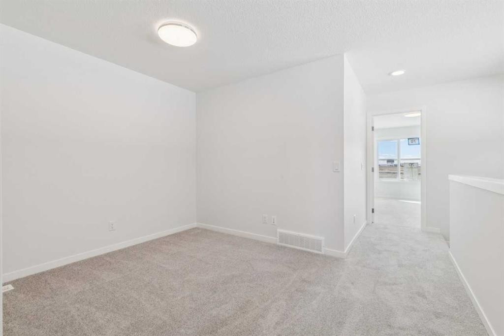 70 Lucas Heath Nw, Calgary, AB - Indoor Photo Showing Other Room