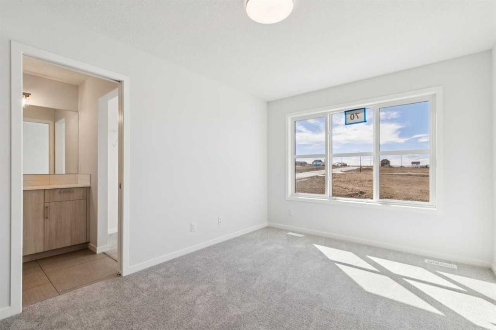 70 Lucas Heath Nw, Calgary, AB - Indoor Photo Showing Other Room