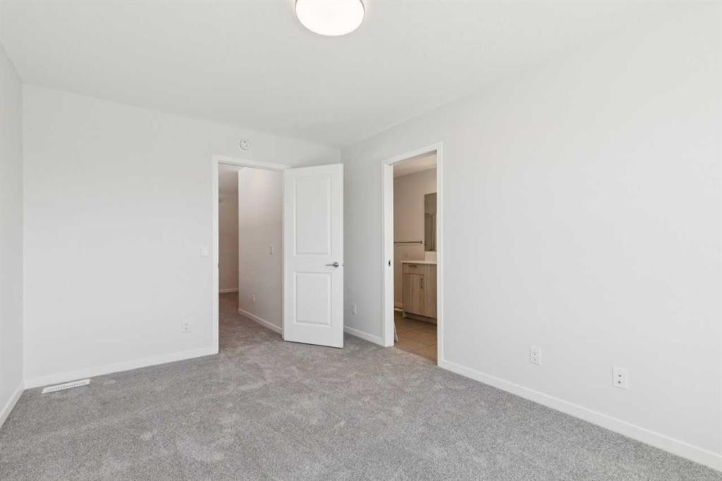 70 Lucas Heath Nw, Calgary, AB - Indoor Photo Showing Other Room