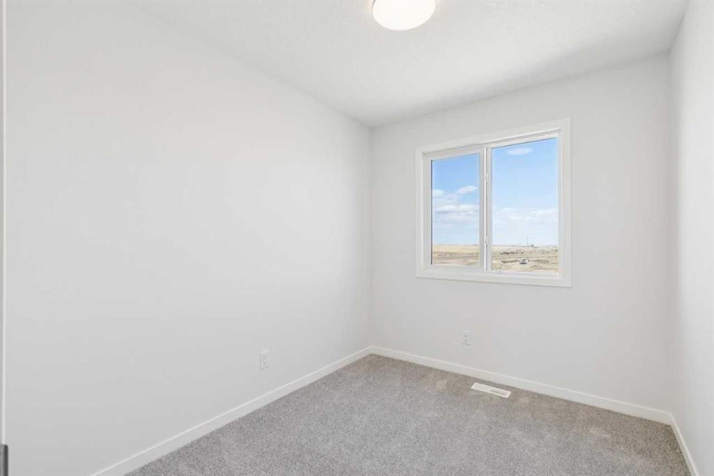 70 Lucas Heath Nw, Calgary, AB - Indoor Photo Showing Other Room