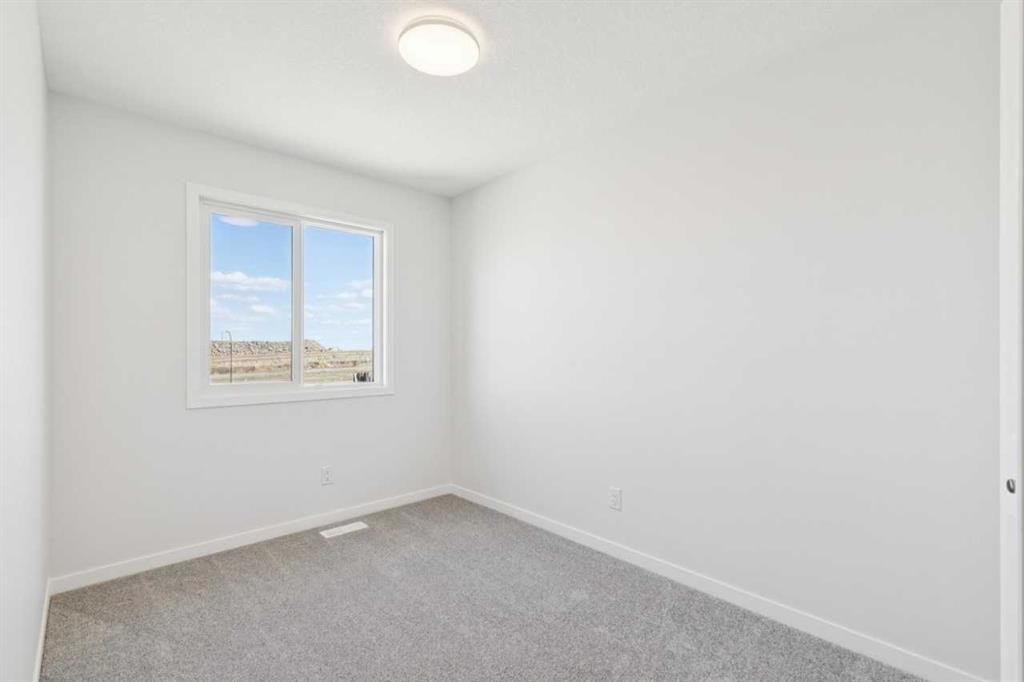 70 Lucas Heath Nw, Calgary, AB - Indoor Photo Showing Other Room