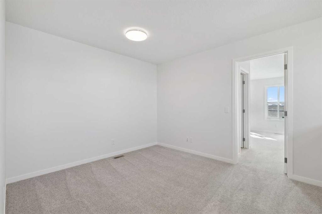74 Lucas Heath Nw, Calgary, AB - Indoor Photo Showing Other Room