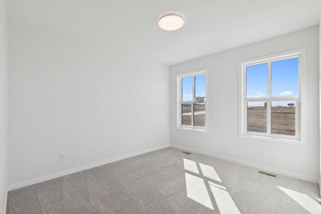 74 Lucas Heath Nw, Calgary, AB - Indoor Photo Showing Other Room