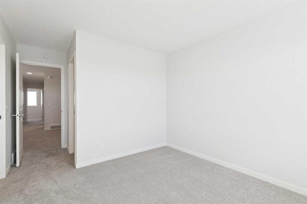 74 Lucas Heath Nw, Calgary, AB - Indoor Photo Showing Other Room