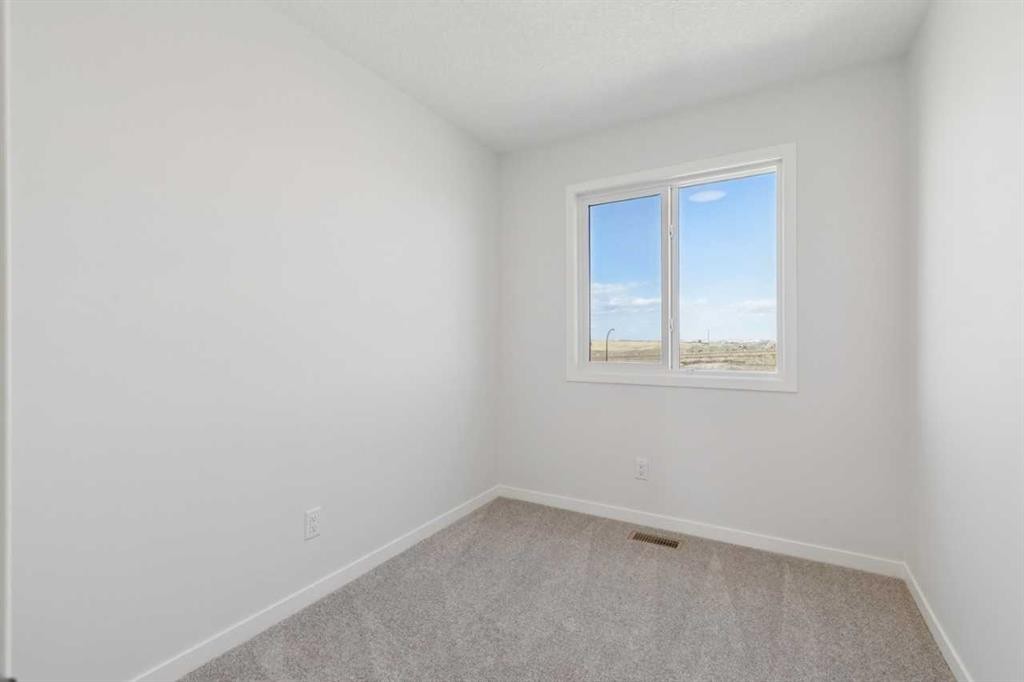 74 Lucas Heath Nw, Calgary, AB - Indoor Photo Showing Other Room