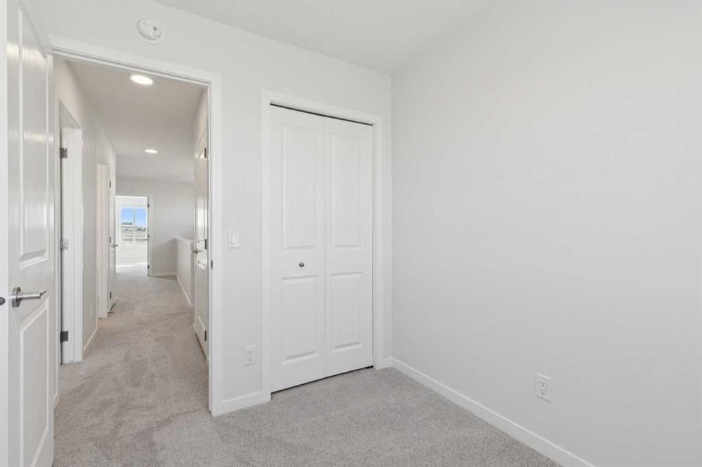 74 Lucas Heath Nw, Calgary, AB - Indoor Photo Showing Other Room