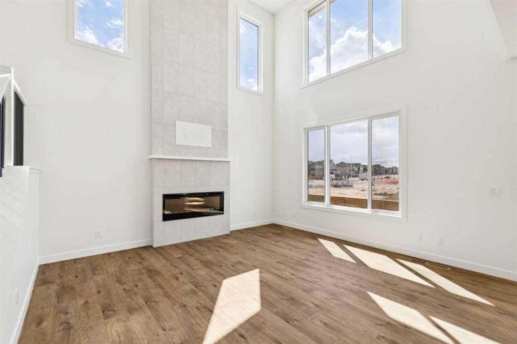 94 Bridgeport Landing, Chestermere, AB - Indoor With Fireplace