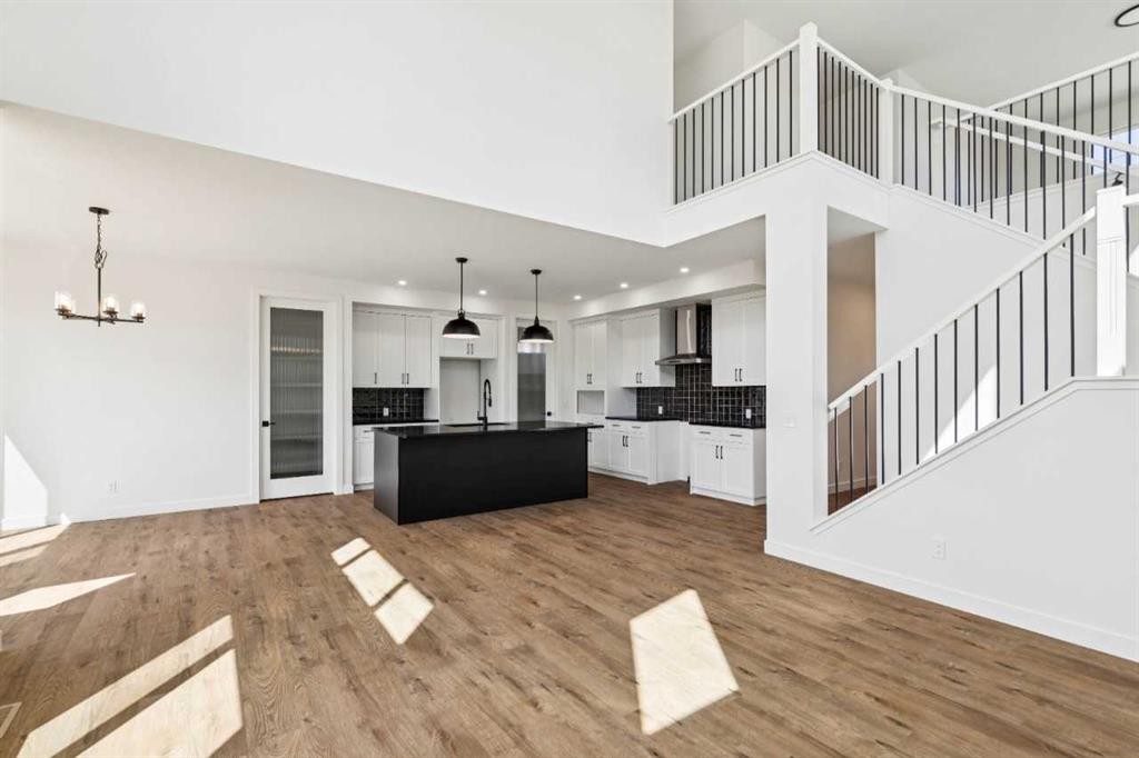 94 Bridgeport Landing, Chestermere, AB - Indoor Photo Showing Other Room