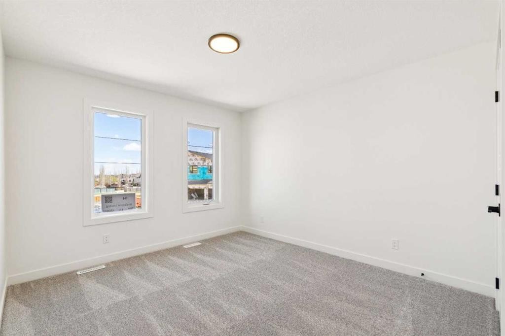 94 Bridgeport Landing, Chestermere, AB - Indoor Photo Showing Other Room