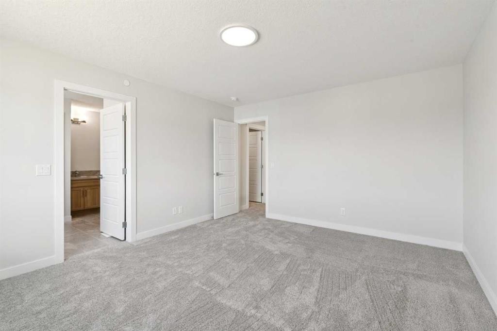 322 Hotchkiss Common Se, Calgary, AB - Indoor Photo Showing Other Room