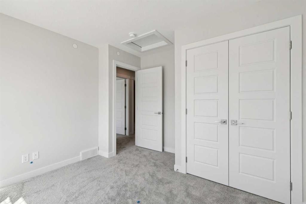 322 Hotchkiss Common Se, Calgary, AB - Indoor Photo Showing Other Room