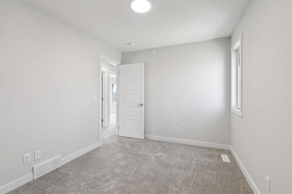 322 Hotchkiss Common Se, Calgary, AB - Indoor Photo Showing Other Room