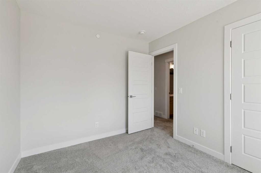 322 Hotchkiss Common Se, Calgary, AB - Indoor Photo Showing Other Room