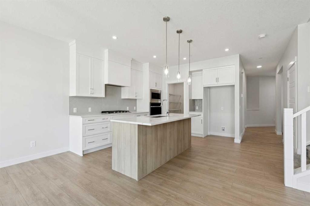 322 Hotchkiss Common Se, Calgary, AB - Indoor Photo Showing Kitchen With Upgraded Kitchen