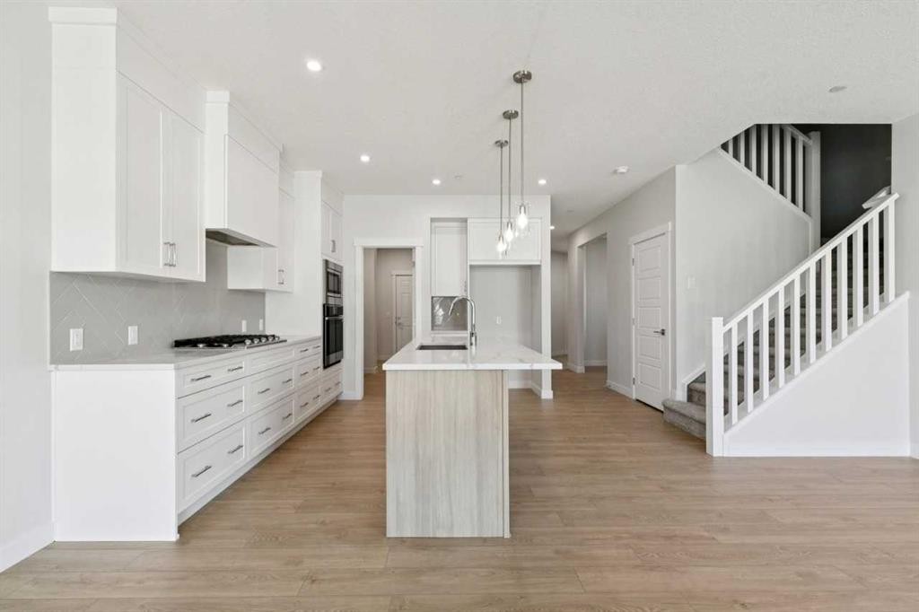 322 Hotchkiss Common Se, Calgary, AB - Indoor Photo Showing Kitchen With Upgraded Kitchen