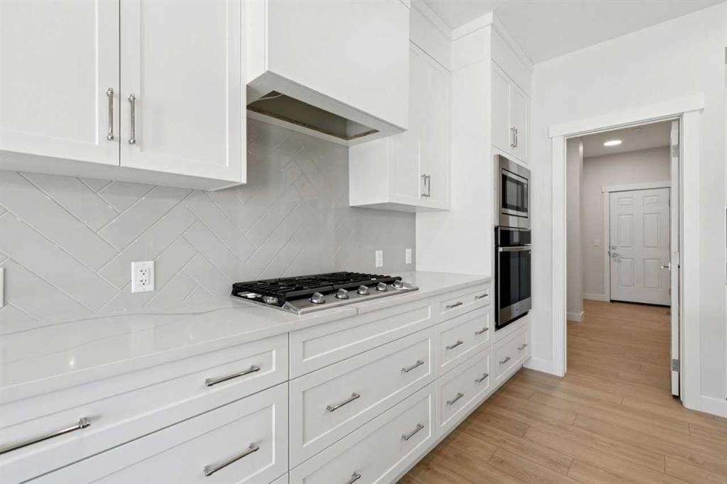 322 Hotchkiss Common Se, Calgary, AB - Indoor Photo Showing Kitchen With Upgraded Kitchen