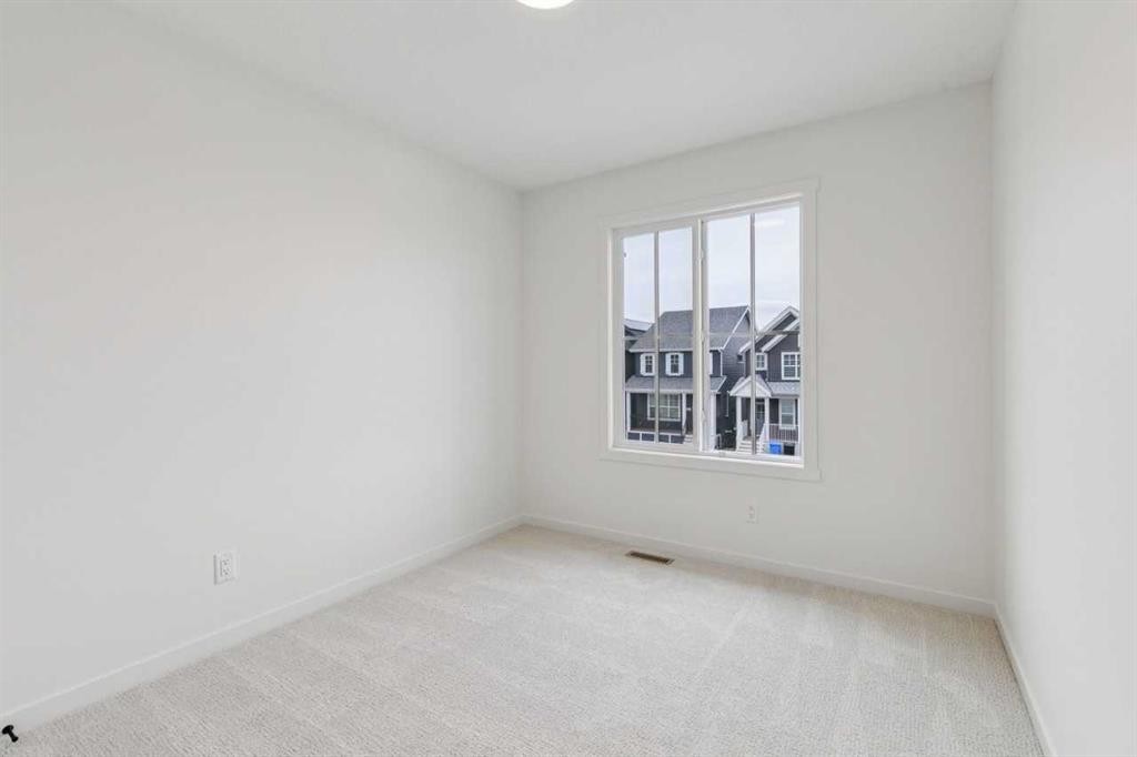 65 Bartlett Way Se, Calgary, AB - Indoor Photo Showing Other Room