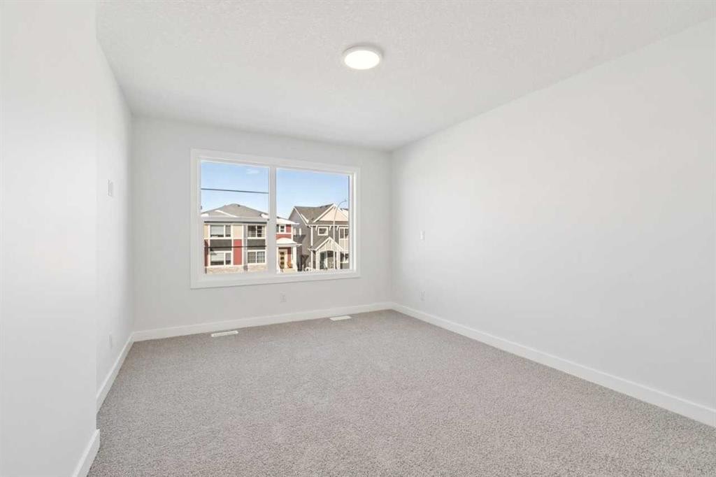 339 Fireside Drive, Cochrane, AB - Indoor Photo Showing Other Room