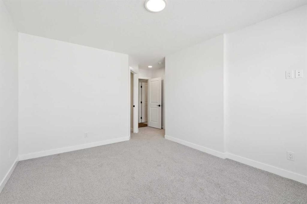 339 Fireside Drive, Cochrane, AB - Indoor Photo Showing Other Room
