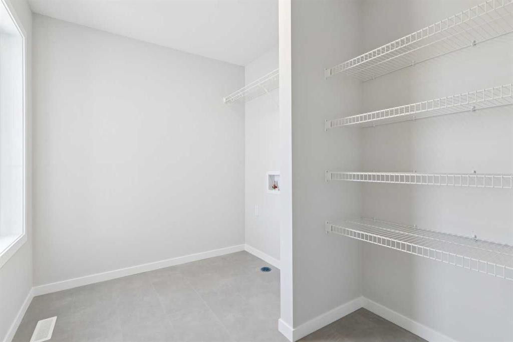 178 Clearwater Terrace, Chestermere, AB - Indoor With Storage