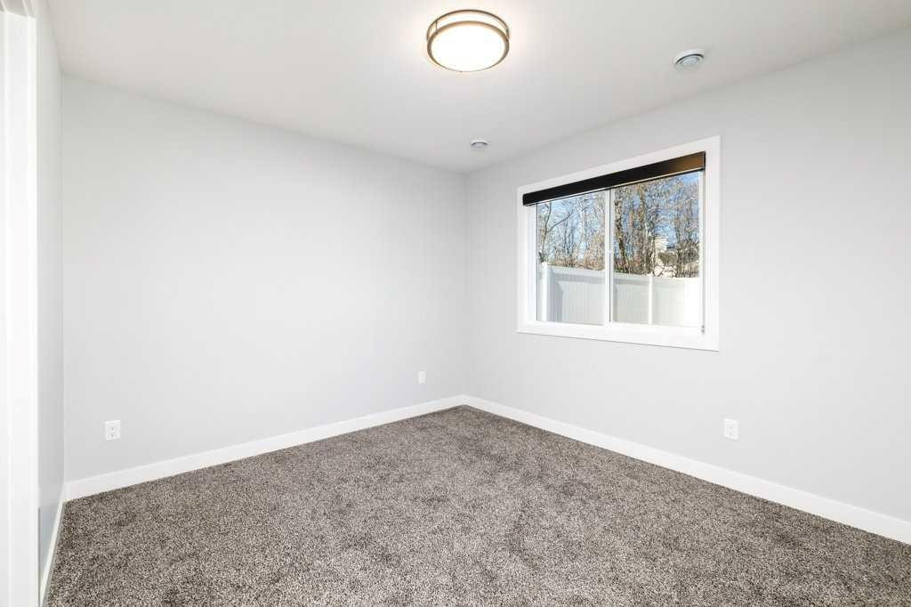 23 Cole Way, Sylvan Lake, AB - Indoor Photo Showing Other Room