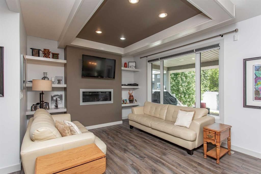 217 Van Slyke Way, Red Deer, AB - Indoor Photo Showing Living Room With Fireplace