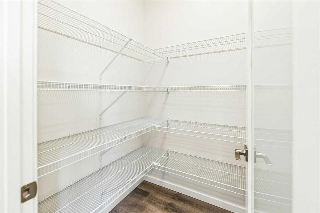 163 Lincoln Crescent, Rural Red Deer County, AB - Indoor With Storage