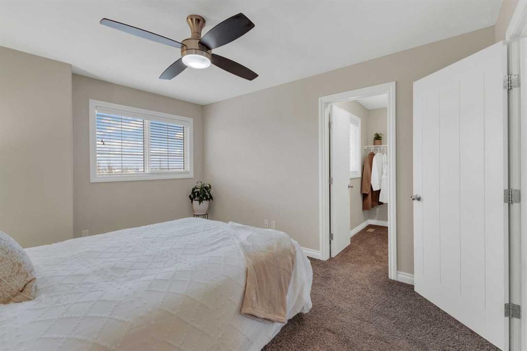 9 Ross Close, Sylvan Lake, AB - Indoor Photo Showing Bedroom