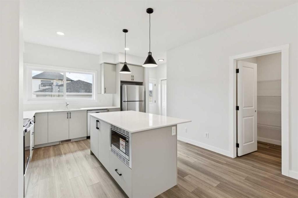244 Drystone Walk Nw, Calgary, AB - Indoor Photo Showing Kitchen With Upgraded Kitchen