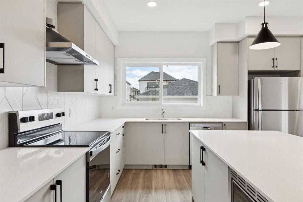244 Drystone Walk Nw, Calgary, AB - Indoor Photo Showing Kitchen With Upgraded Kitchen