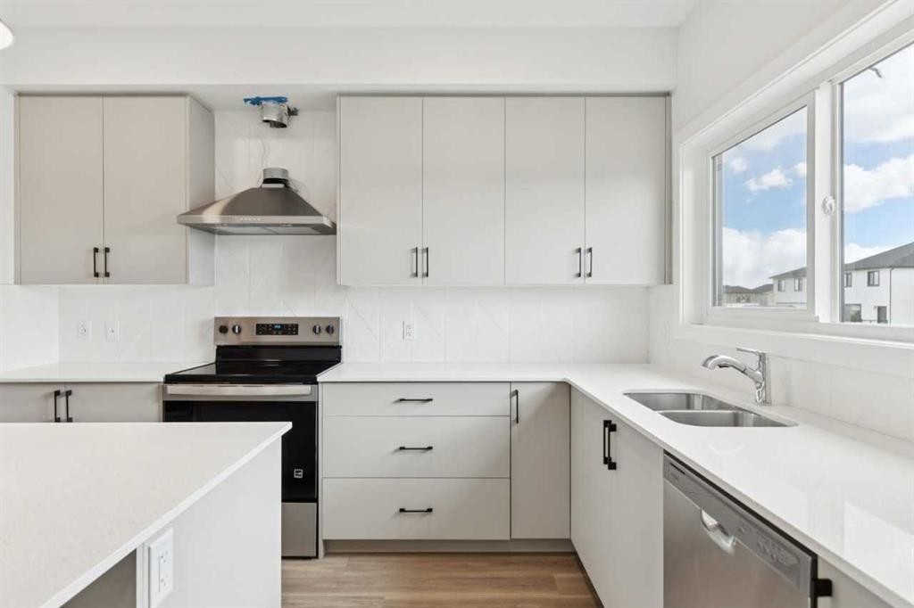 244 Drystone Walk Nw, Calgary, AB - Indoor Photo Showing Kitchen With Double Sink