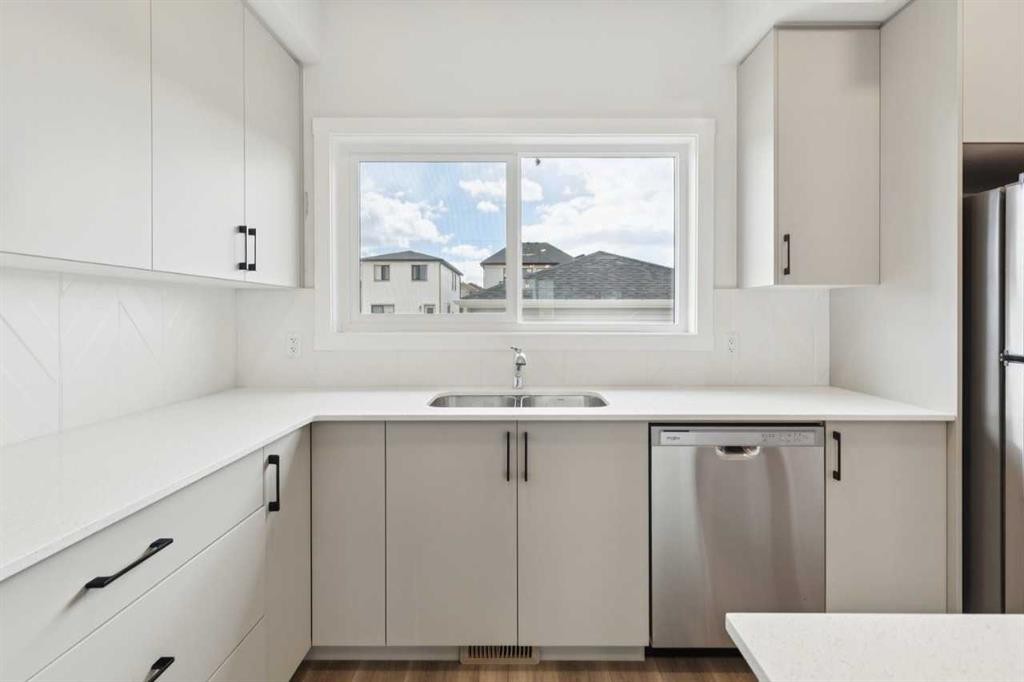 244 Drystone Walk Nw, Calgary, AB - Indoor Photo Showing Kitchen With Double Sink