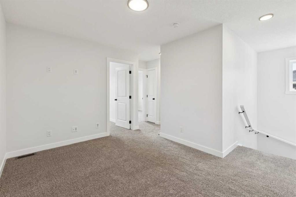 244 Drystone Walk Nw, Calgary, AB - Indoor Photo Showing Other Room