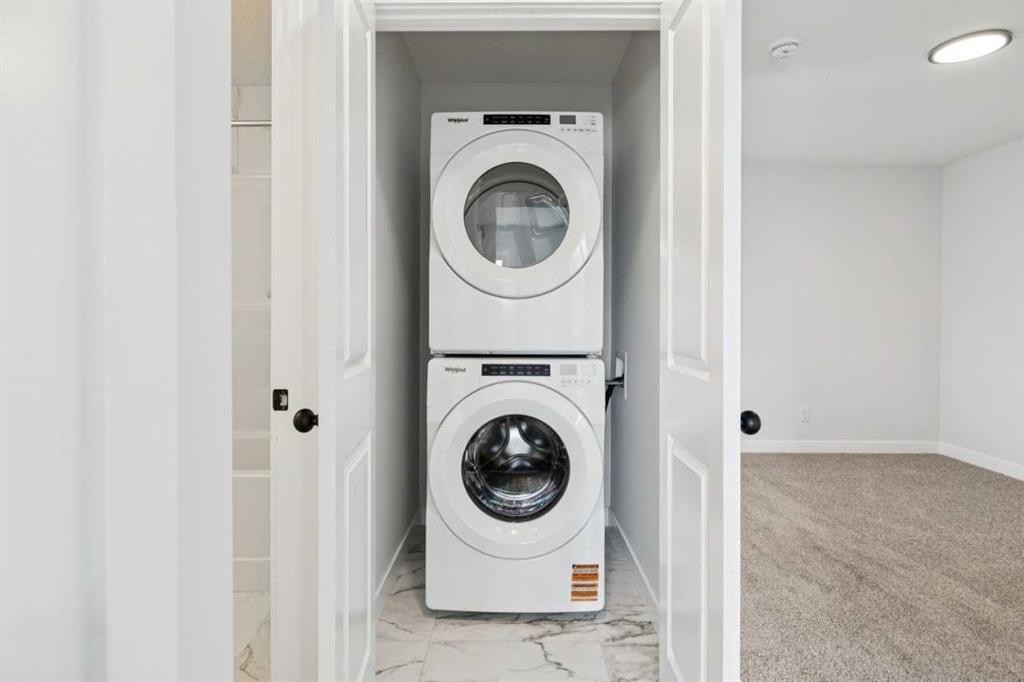 244 Drystone Walk Nw, Calgary, AB - Indoor Photo Showing Laundry Room