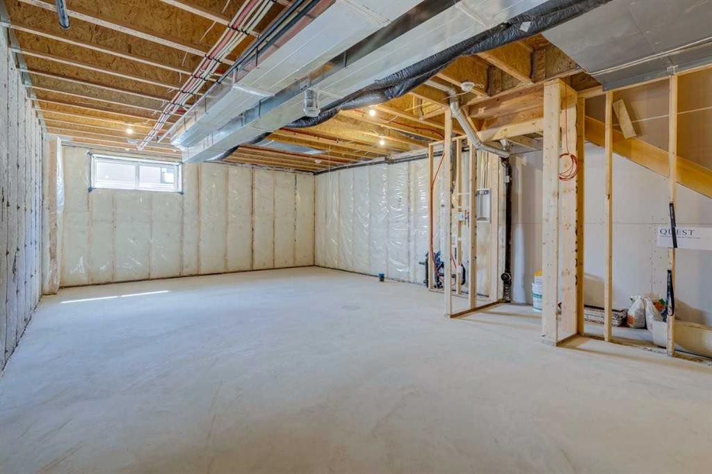 244 Drystone Walk Nw, Calgary, AB - Indoor Photo Showing Basement