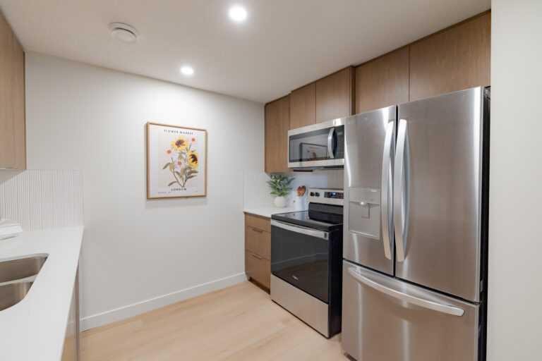 194 Drystone Way Nw, Calgary, AB - Indoor Photo Showing Kitchen With Double Sink