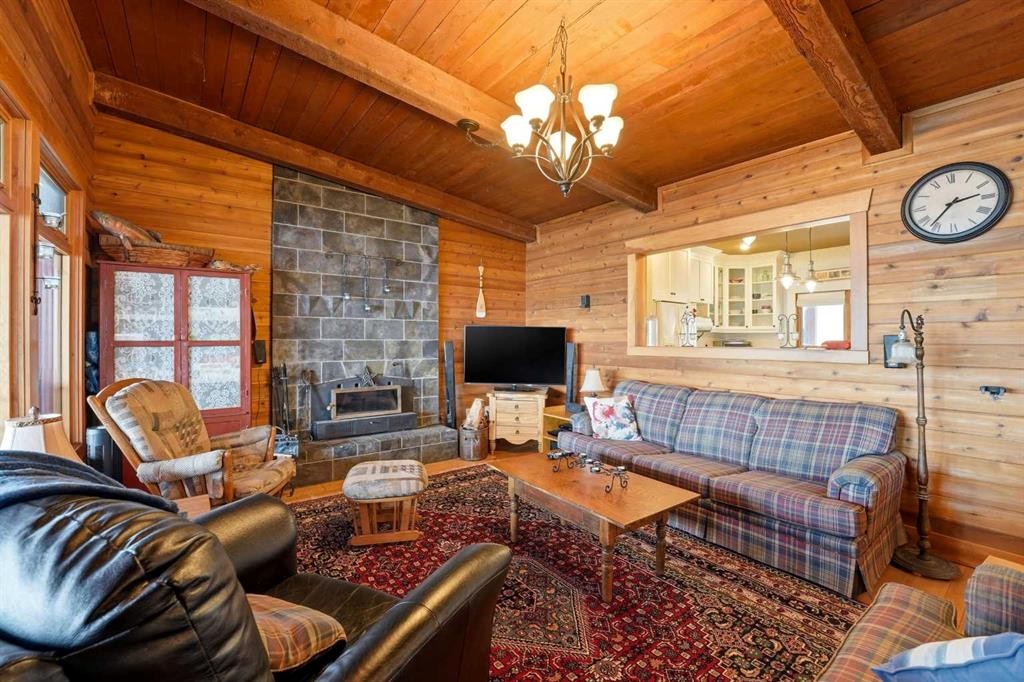 361 Birchcliff Road, Birchcliff, AB - Indoor Photo Showing Living Room With Fireplace