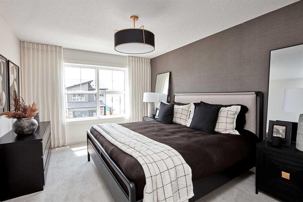 76 Emberside Grove, Cochrane, AB - Indoor Photo Showing Bedroom