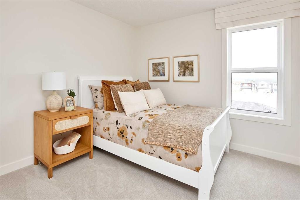 76 Emberside Grove, Cochrane, AB - Indoor Photo Showing Bedroom