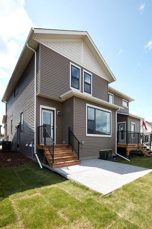 76 Emberside Grove, Cochrane, AB - Outdoor With Deck Patio Veranda