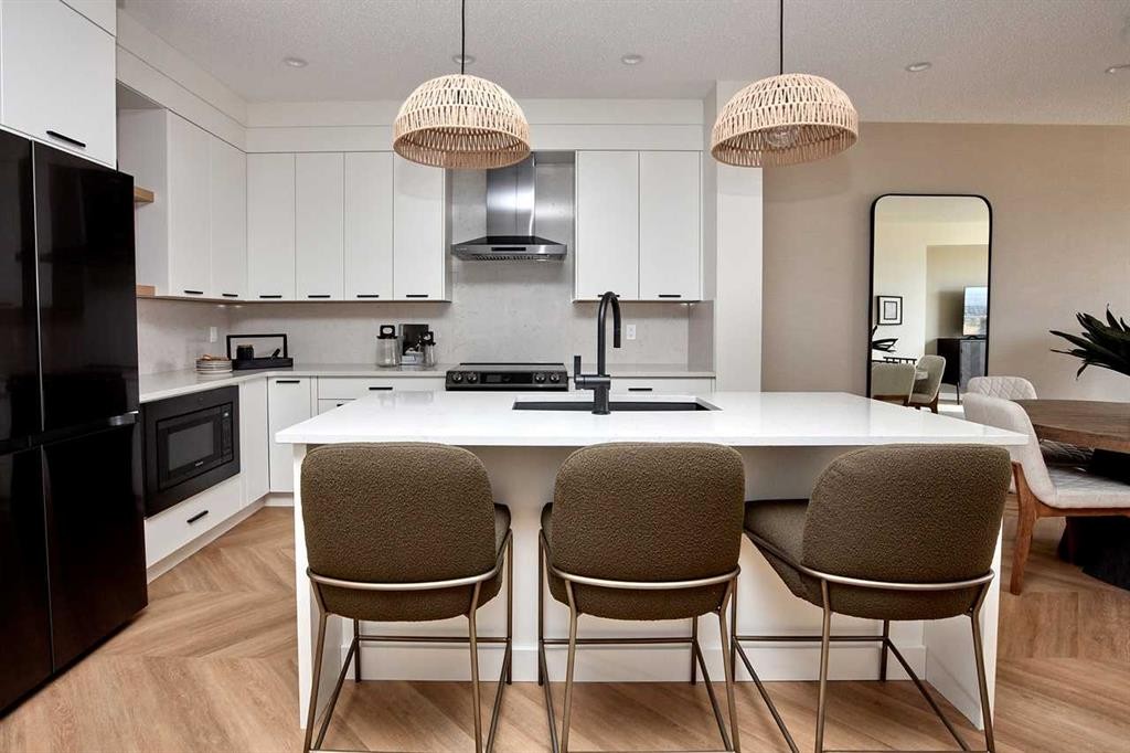 76 Emberside Grove, Cochrane, AB - Indoor Photo Showing Other Room