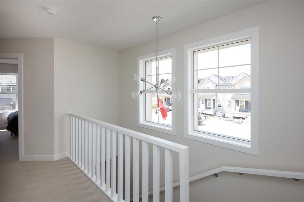 80 Emberside Grove, Cochrane, AB - Indoor Photo Showing Other Room