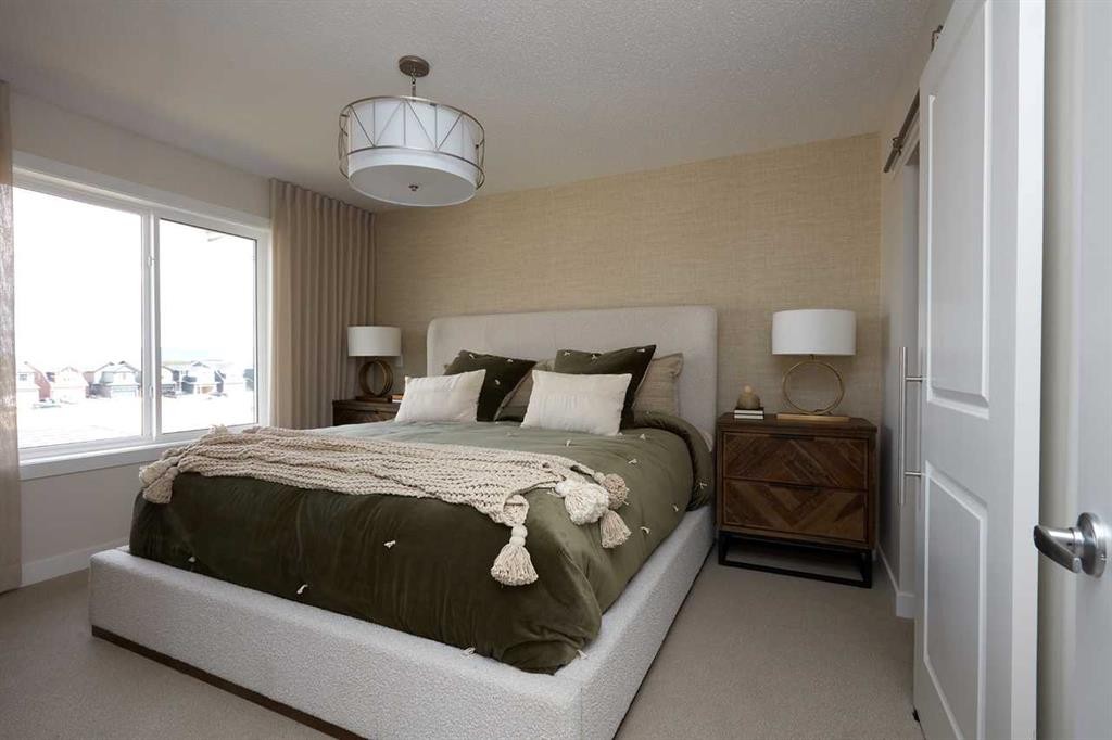 80 Emberside Grove, Cochrane, AB - Indoor Photo Showing Bedroom