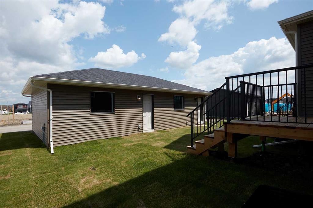 80 Emberside Grove, Cochrane, AB - Outdoor With Deck Patio Veranda