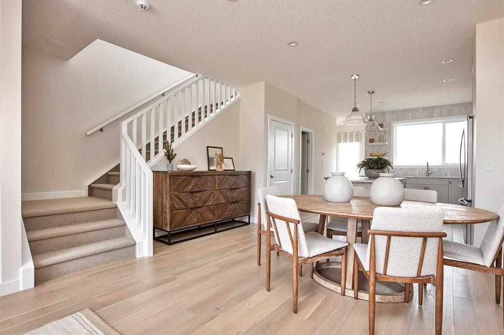 80 Emberside Grove, Cochrane, AB - Indoor Photo Showing Dining Room
