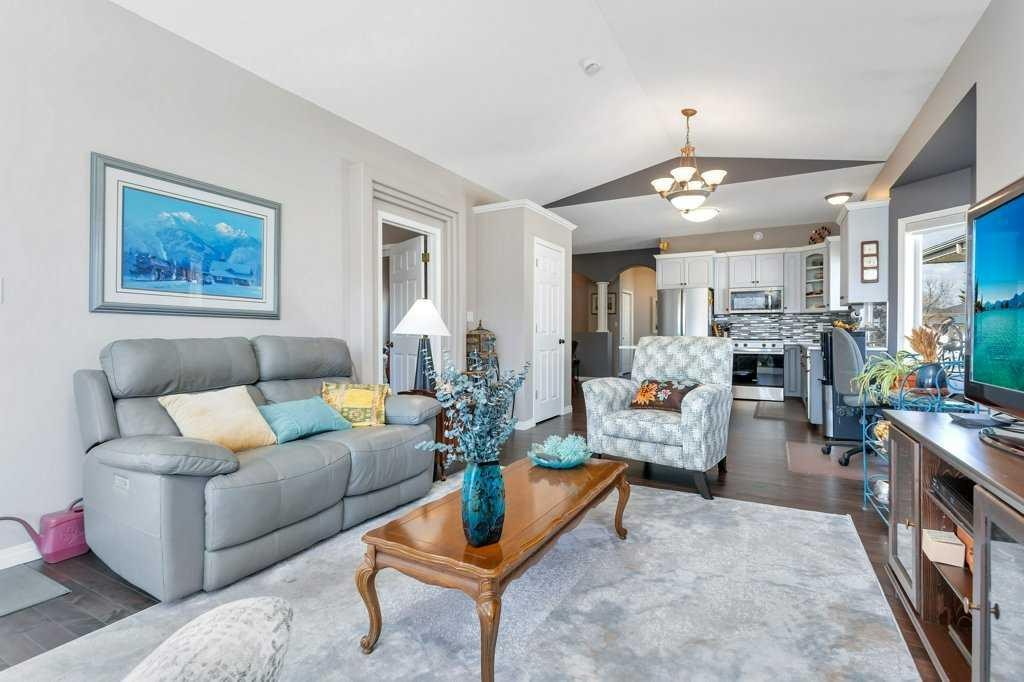 10-32 Dowler Street, Red Deer, AB - Indoor Photo Showing Living Room With Fireplace