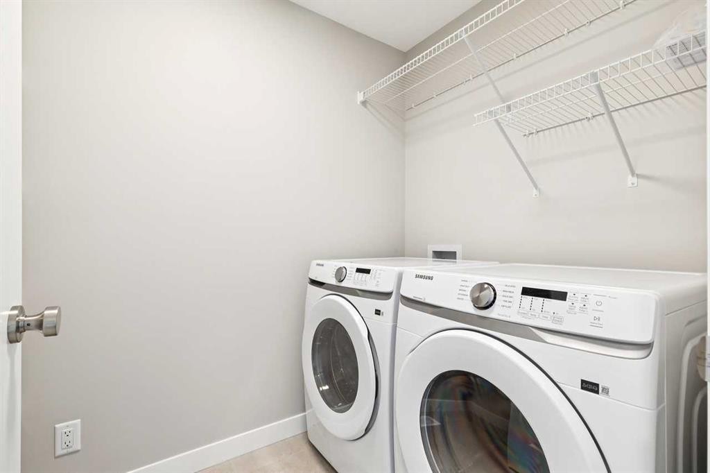 413 Shawnee Terrace Sw, Calgary, AB - Indoor Photo Showing Laundry Room
