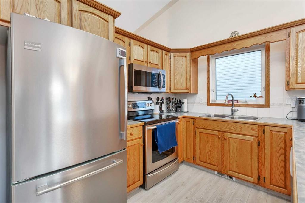 34 Lund Close, Red Deer, AB - Indoor Photo Showing Kitchen With Double Sink