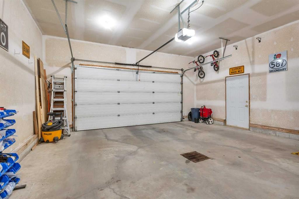 34 Lund Close, Red Deer, AB - Indoor Photo Showing Garage
